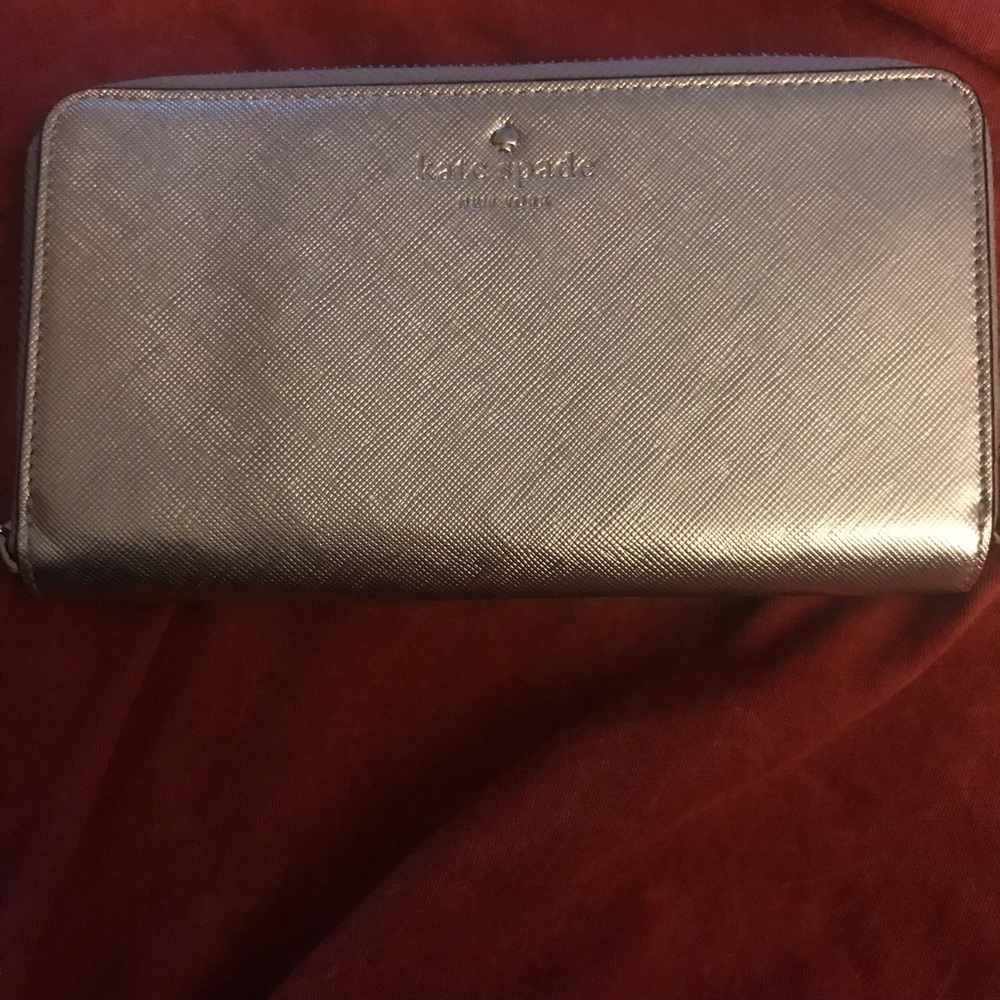 Metallic Gold Kate Spade Wristlet; good condition. - Picture 2 of 8